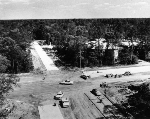 An image of the intersection of Timberloch Place and Grogan's Mill Road in The Woodlands in 1974 shows just how much building needed to be done.